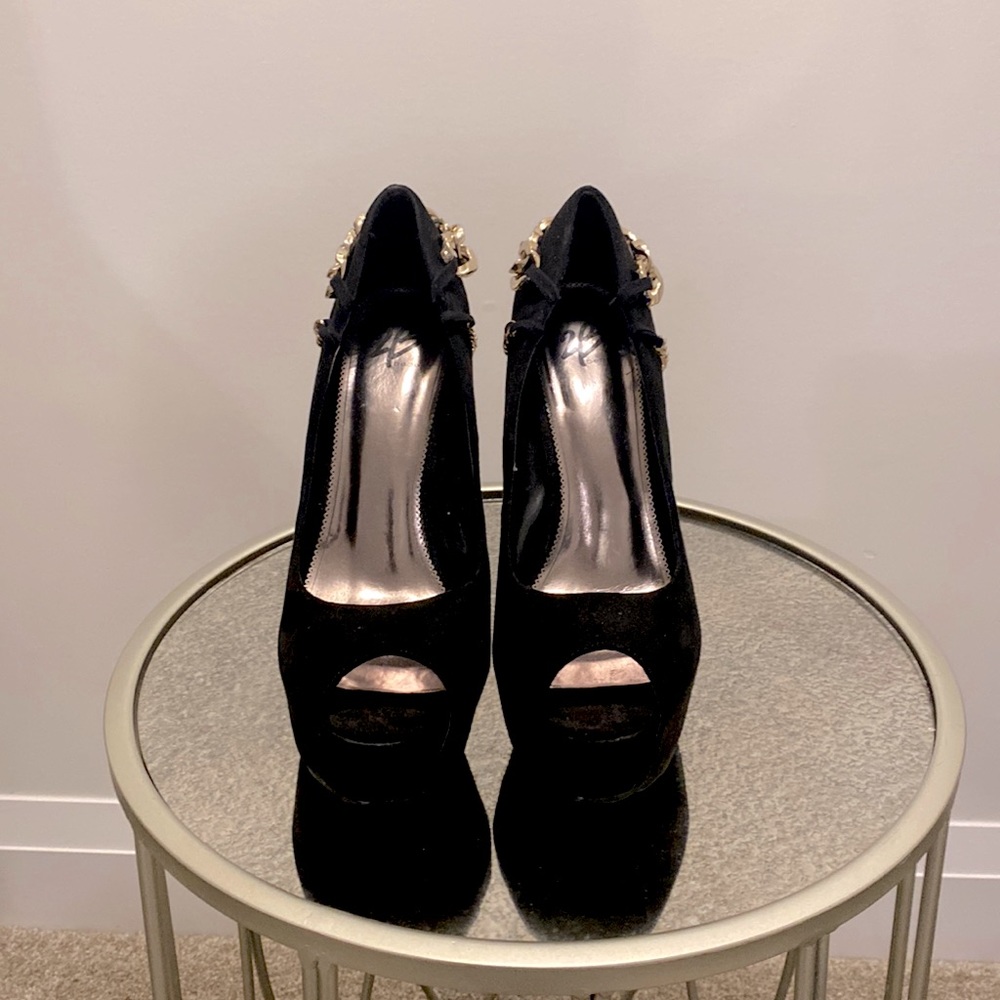 Black heel open toe shoes
